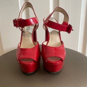 Red Michael Kors platform heels